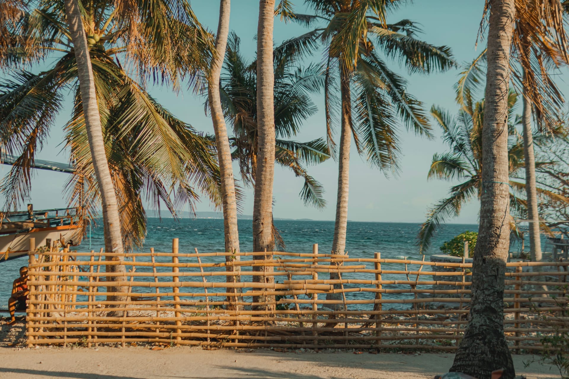 A foreign buyer and a local landowner inspecting a beachfront land plot near Nembrala on Rote island