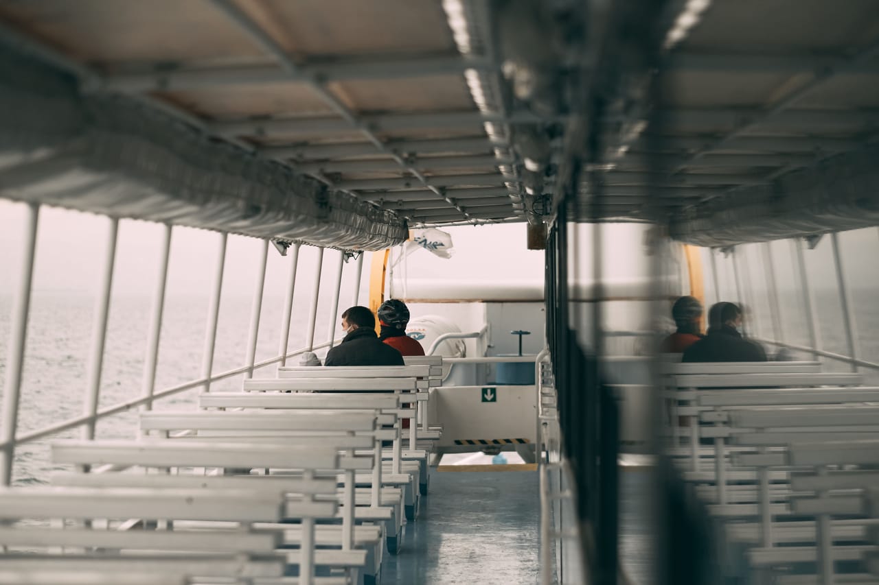 Open deck of a fast ferry crossing the Savu Sea with passengers and luggage
