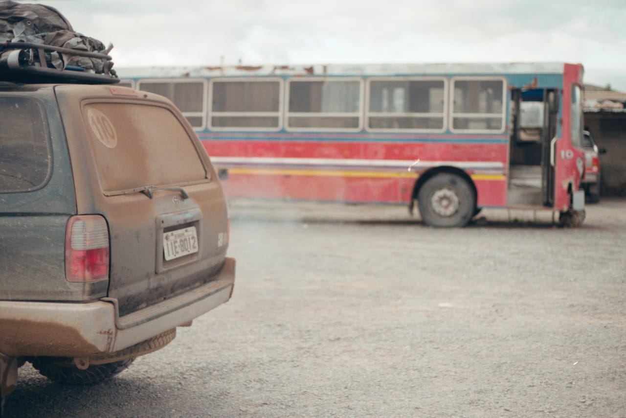 A decorated bemo microbus on a Kupang street, the local transport connecting the city's districts