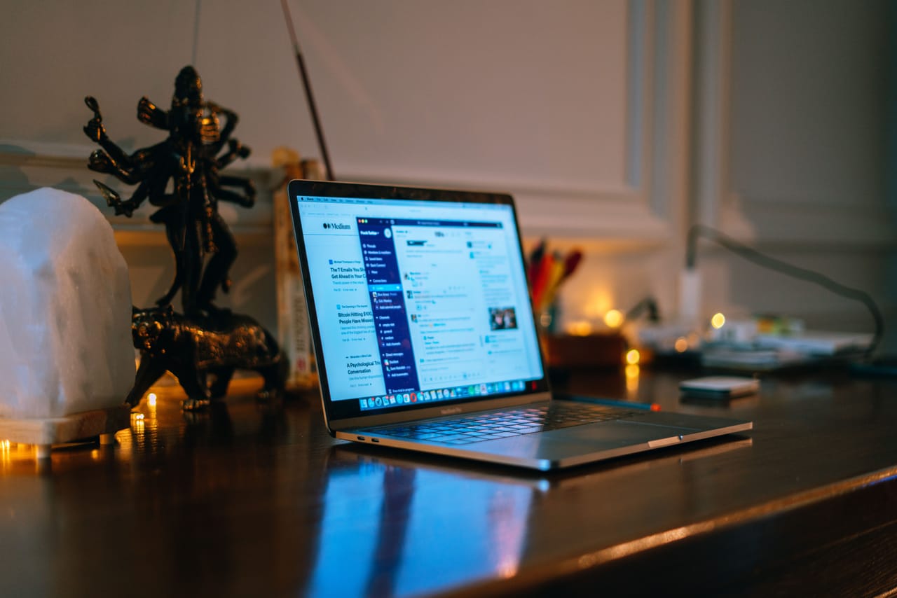 Laptop on battery power beside a phone with mobile signal during a power cut on Rote island