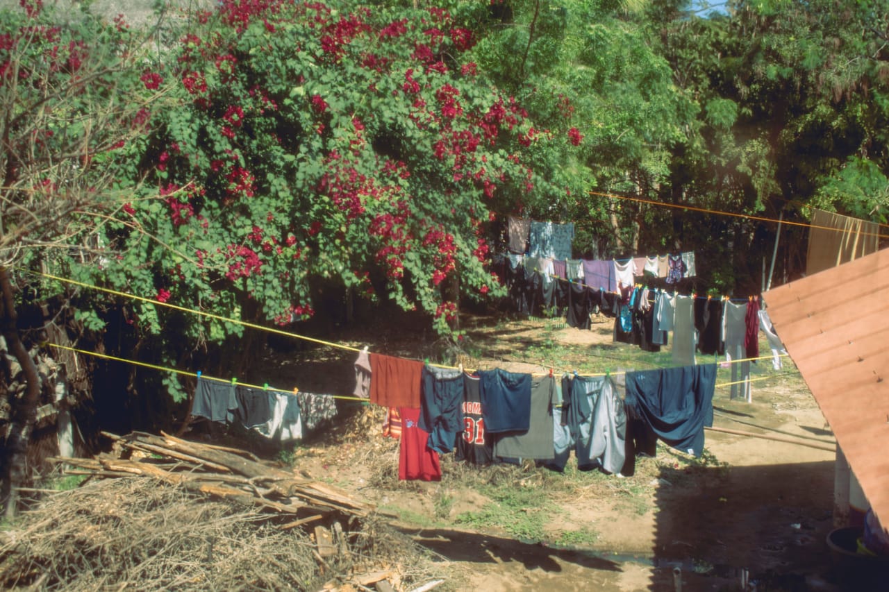 Simple room in a Rotenese village homestay compound where long-stayers rent by the month